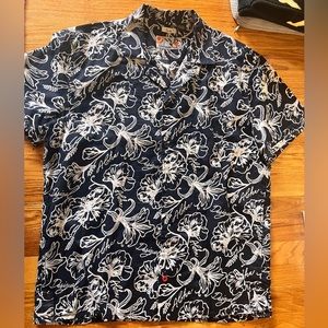 Desigual - A short-sleeve resort shirt in cotton fabric with aloha floral print.